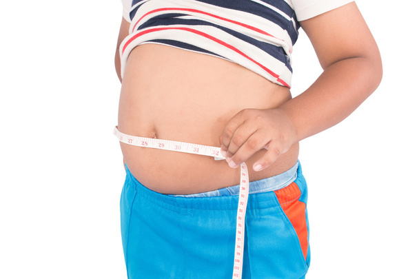 Chico gordo con cinta métrica
 - Foto, imagen
