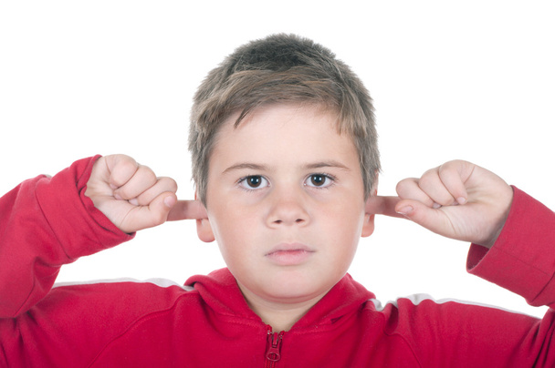 Boy closes ears fingers - Φωτογραφία, εικόνα