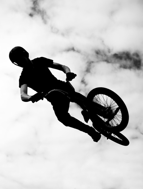 silhouette of bmx riders in action - Photo, Image