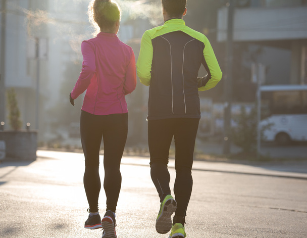 young  couple jogging - Valokuva, kuva
