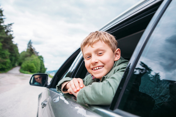 Little boy  travel in car  - Фото, изображение
