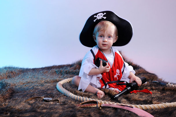 Cute little boy in the pirate costume - 写真・画像