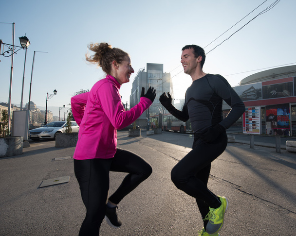couple warming up before jogging - Фото, изображение