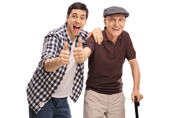 Man and a senior giving a thumb up - Fotó, kép