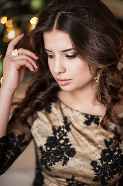 Christmas Mood. Beautiful woman model. Makeup. Healthy long hair - Valokuva, kuva