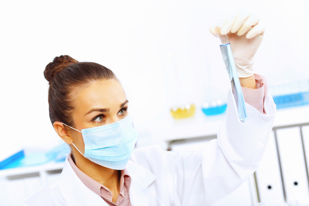 Young female scientist working in laboratory - Fotografie, Obrázek