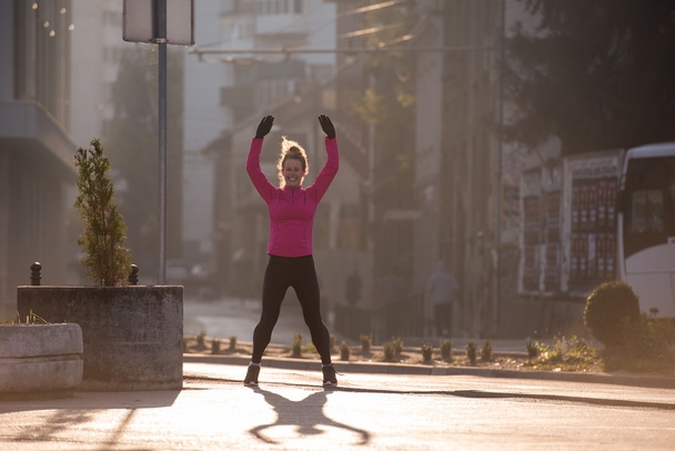 woman  stretching before morning jogging - Foto, imagen