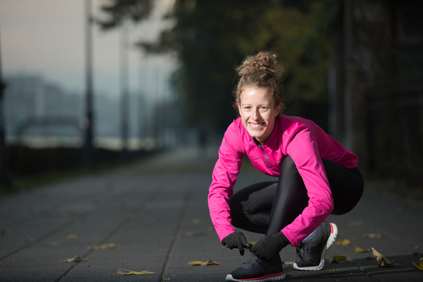 woman  stretching before morning jogging - Fotoğraf, Görsel