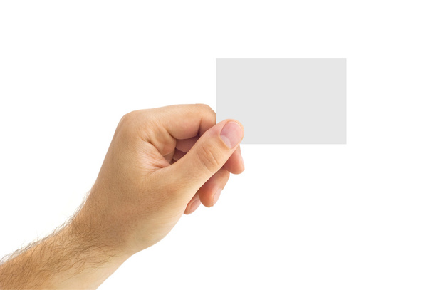Empty business card in a human hand - 写真・画像