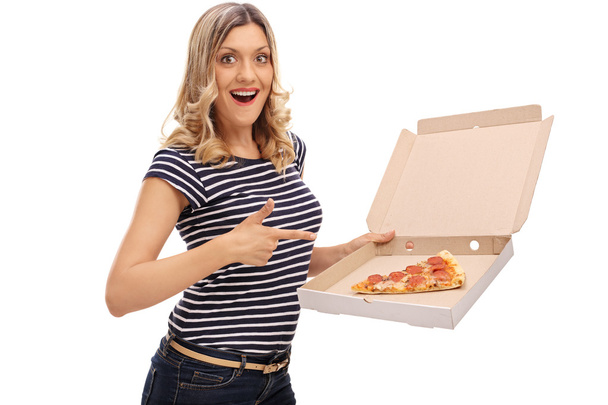 Cheerful woman holding a pizza box - Photo, image