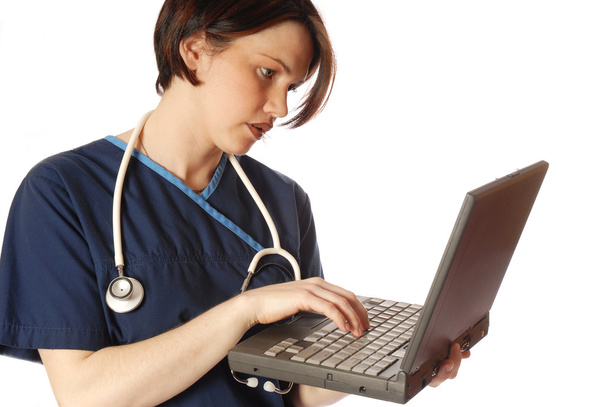 Nurse with laptop - Foto, Imagen