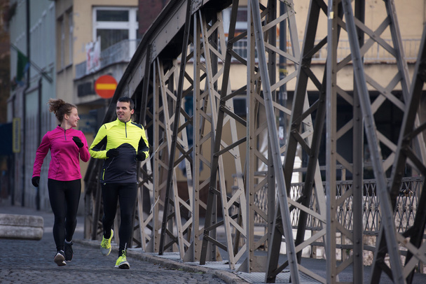 young  couple jogging - Foto, Imagen