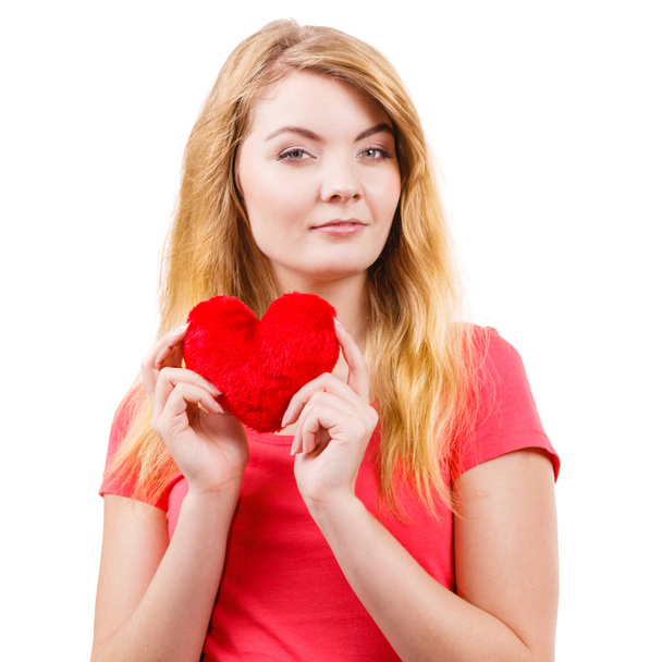 Woman blonde girl holding red heart love symbol  - Foto, Imagem