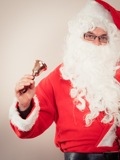 Santa Claus with jingle bell. - Photo, Image