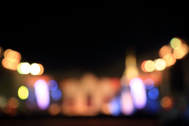 Sokszínű város fényei elmosódott háttér bokeh. - Fotó, kép