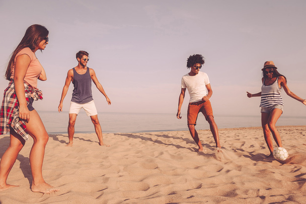 best friends playing beach football - Photo, Image
