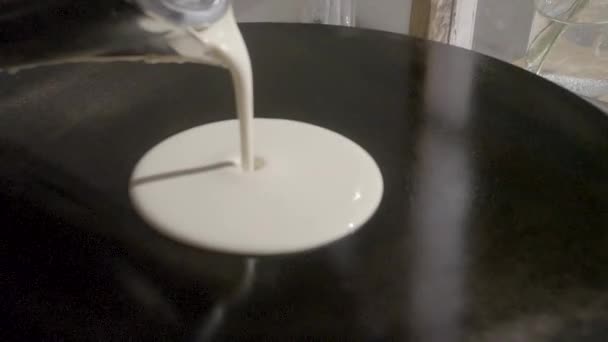 Slow-motion. Defocus on dough pour on crepes / pancake maker. SLOG3, medium shot. - Footage, Video