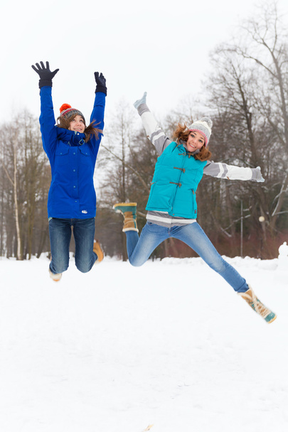 Winter women have fun outdoors - Φωτογραφία, εικόνα