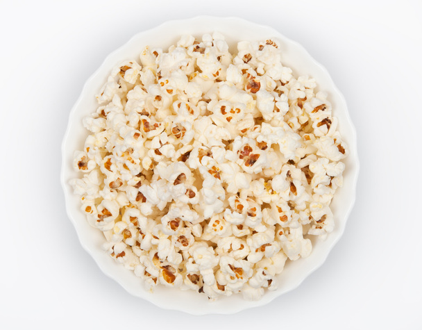 Bowl of popcorn on grey background. Top view - Photo, Image