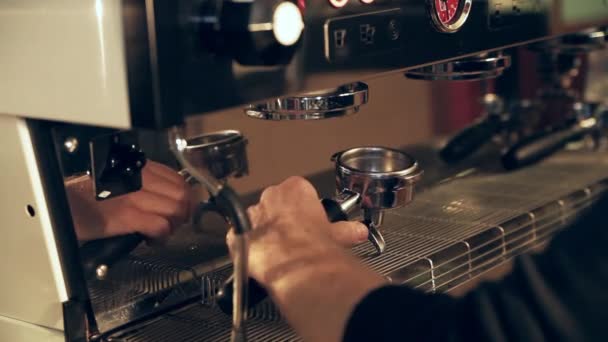 Barista prepares filter in holder for lungo coffee - Felvétel, videó