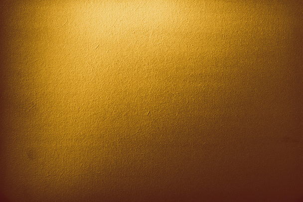 Spot ışık ile karanlık altın gradyan arka planı - Fotoğraf, Görsel
