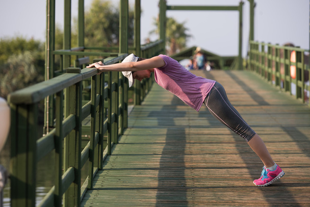 woman  stretching before morning jogging - Photo, Image