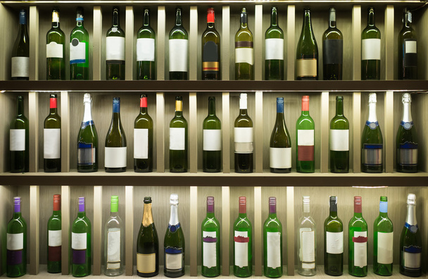 Old Bottles in wooden shelf - Photo, Image