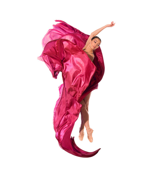 Ballet dancer in flying satin dress - Foto, afbeelding