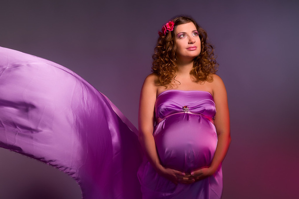 Pregnant girl with flying dress - Foto, immagini