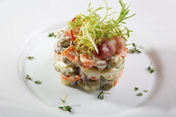 Russian salad with Bacon on plate - Photo, Image