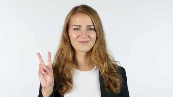 Businesswoman Showing Victory Sign , Portrait, White background - Footage, Video