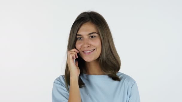 Girl Talking on Phone, White Background in Studio - Video