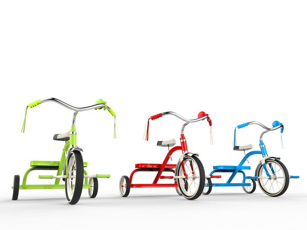 Triciclos vermelho, verde e azul
 - Foto, Imagem