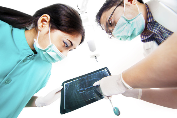 Asian dentist and assistant with x-ray - Foto, imagen