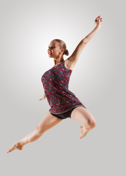 Girl in color dress dancing - Valokuva, kuva