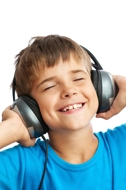 The boy is listening to music - Φωτογραφία, εικόνα