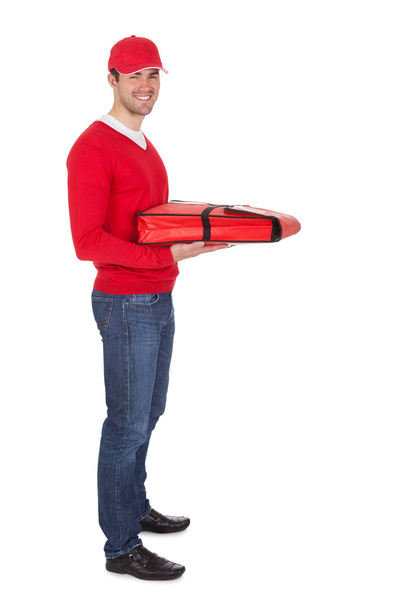 Portrait of pizza delivery boy with thermal bag - Foto, Bild