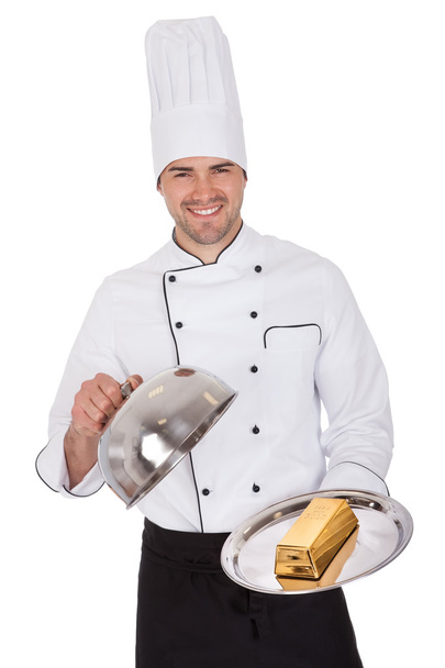 Portrait of happy chef holding tray - Foto, afbeelding