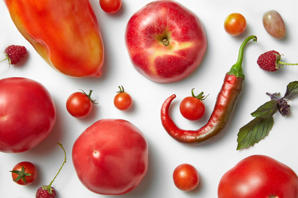Red chili pepper and tomato . - Foto, afbeelding