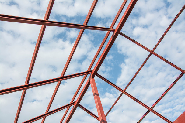 roof construction with blue sky - Foto, Bild