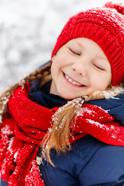 Little girl outdoors on winter - Photo, image