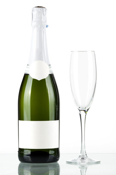 Bottle of champagne with blank label and - Zdjęcie, obraz