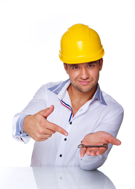 Muotokuva seksikäs työntekijä poseeraa studiossa kypärä
 - Valokuva, kuva