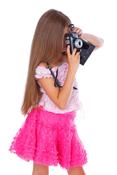 Porträt eines jungen Mädchens, das mit der Kamera posiert - Foto, Bild