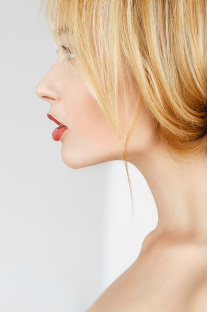Close-up profile of redhead woman - Fotoğraf, Görsel