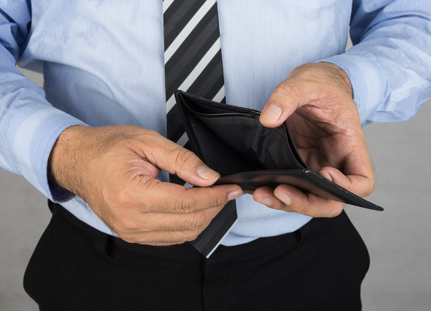 bankrupt, man showing an empty wallet no money - Photo, Image