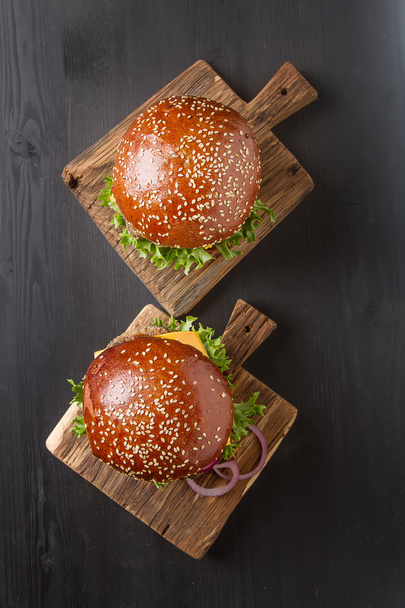 Closeup of home made beef burgers with lettuce and mayonnaise se - Fotografie, Obrázek