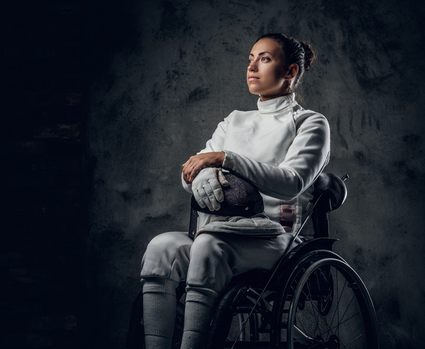 Female fencer in wheelchair  - Photo, Image