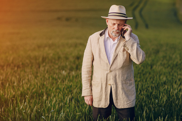 old man in field - Foto, Imagem