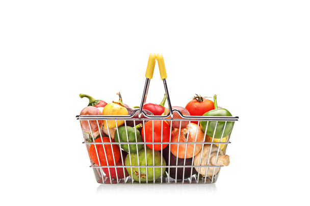 Shopping basket full of fruit and vegetables - Φωτογραφία, εικόνα